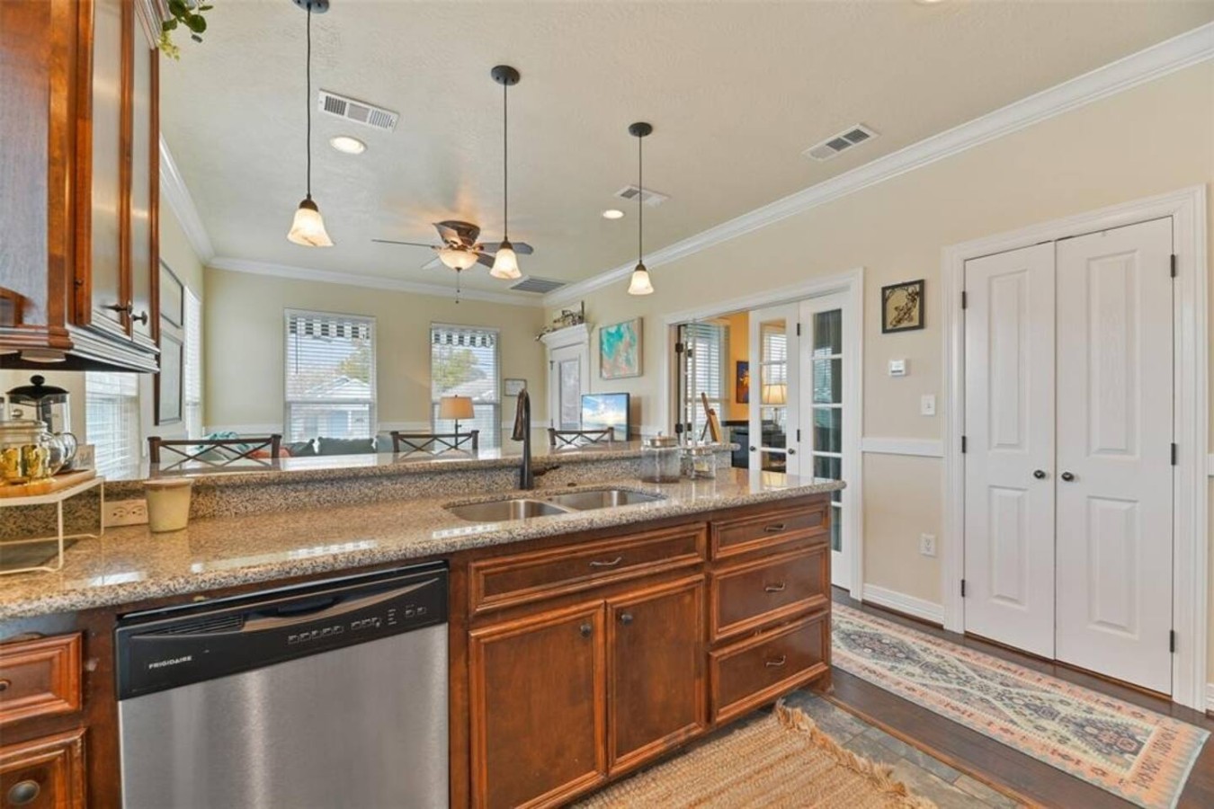 Rich wood cabinetry adds warmth to this classic kitchen