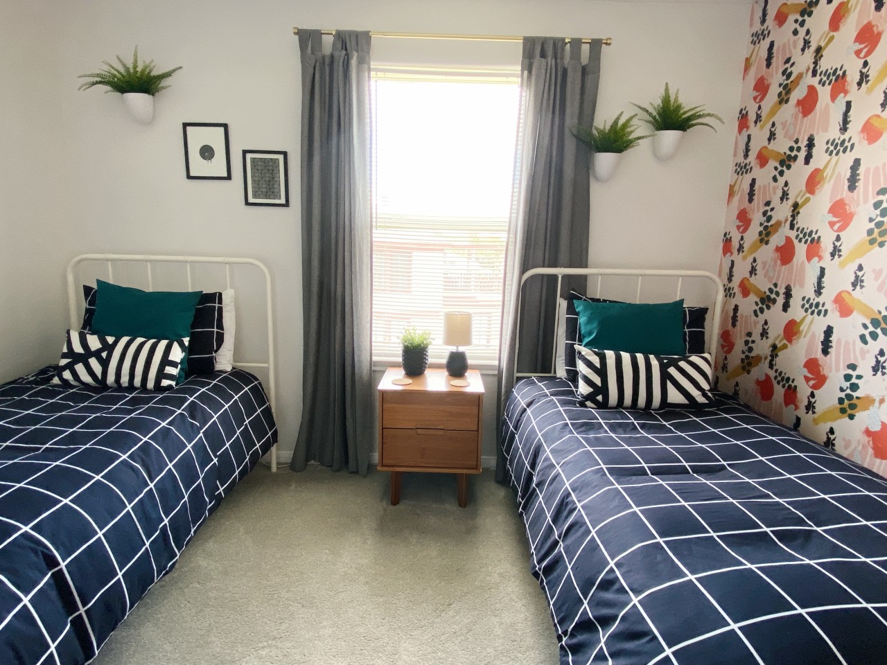 This bedroom has 2 twin-sized beds