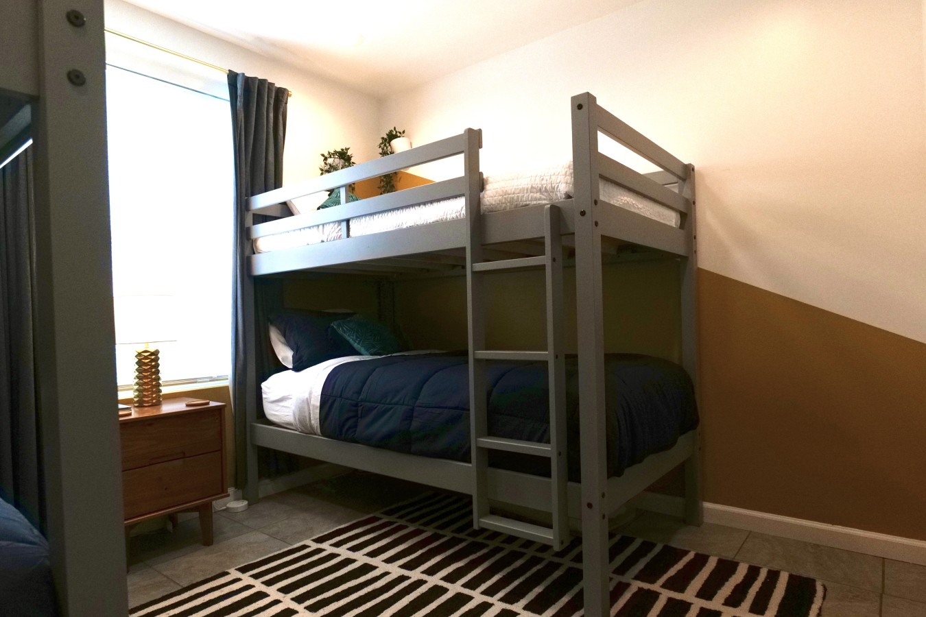 Relax & recharge in this vibrant & inviting bedroom