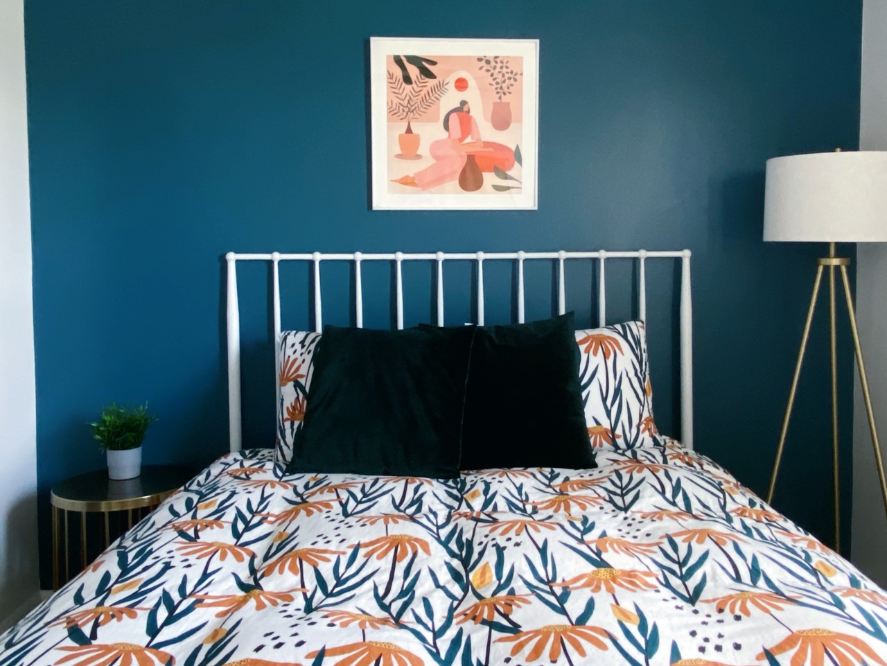 This bedroom has a queen-sized bed