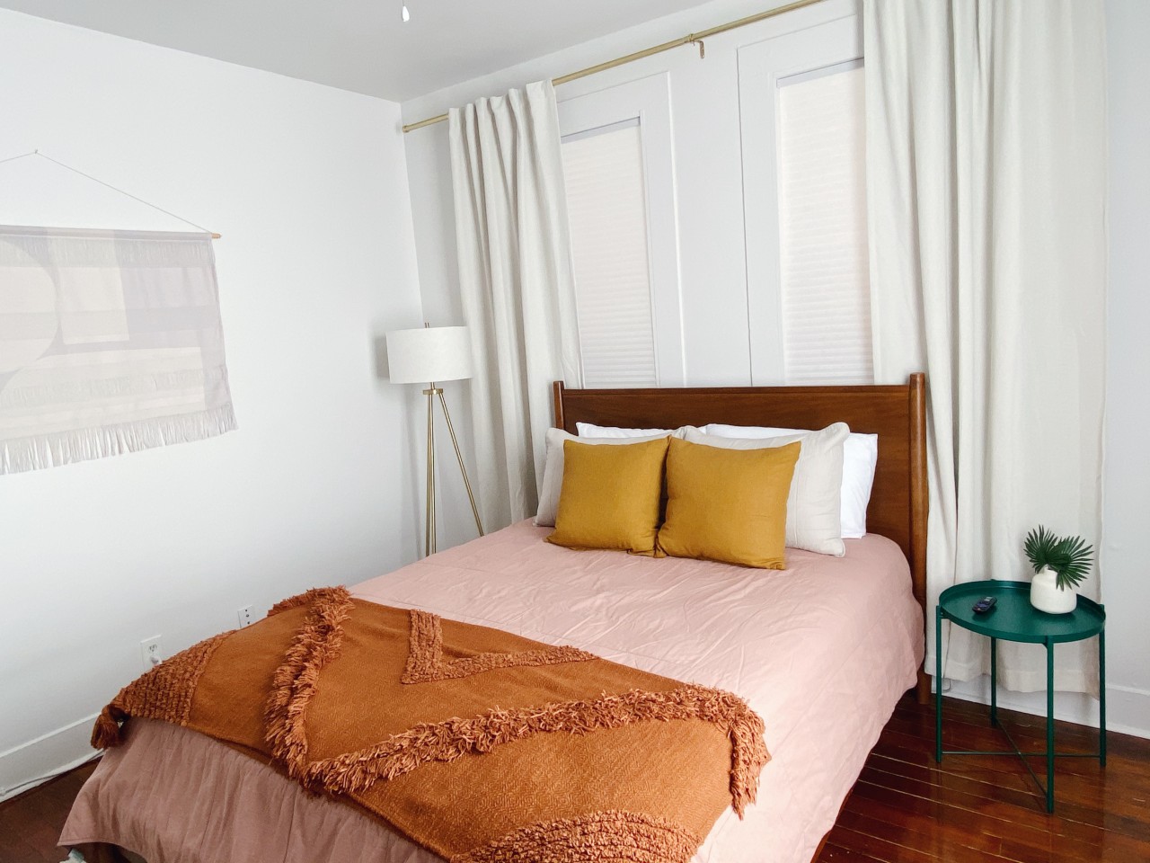 This bedroom has a queen-sized bed