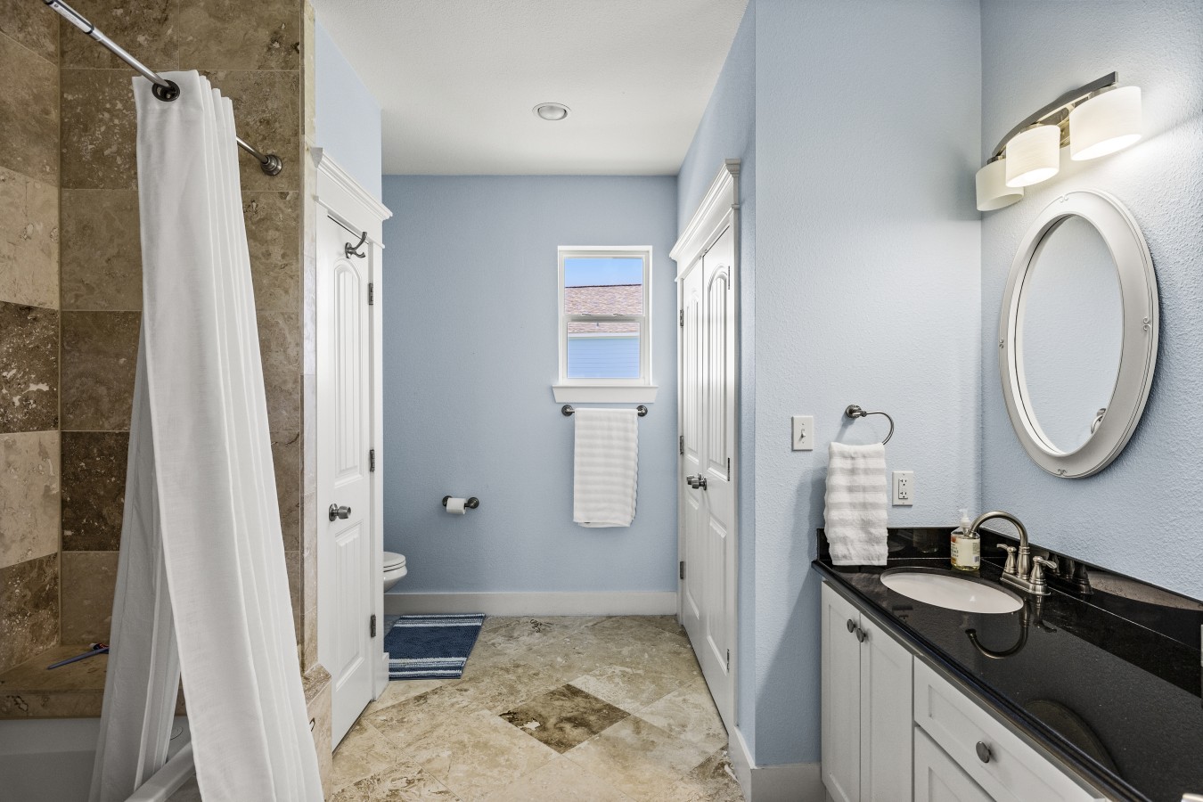 This bathroom offers a place to relax after a long day