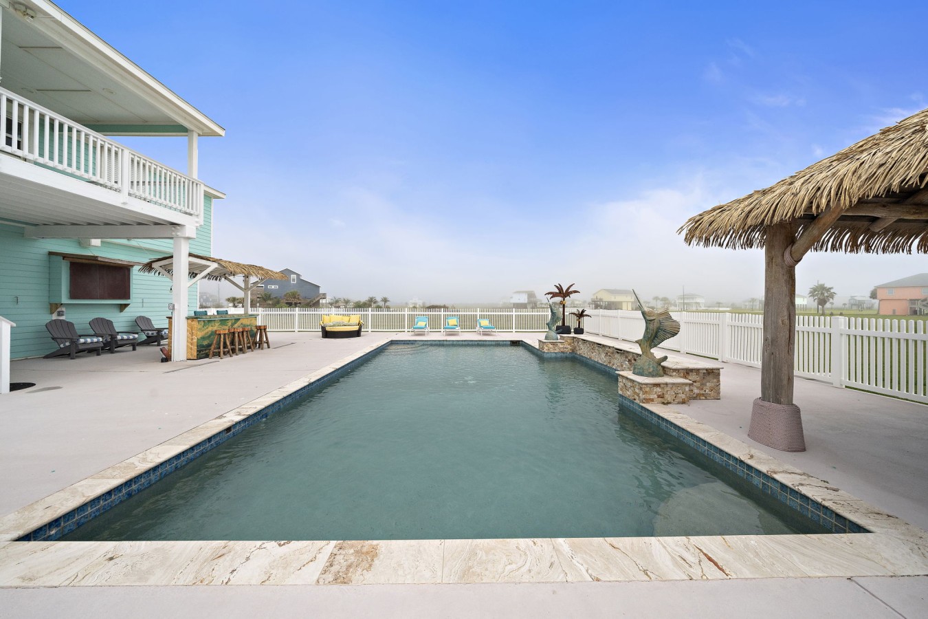 Large pool deck with seating for everyone