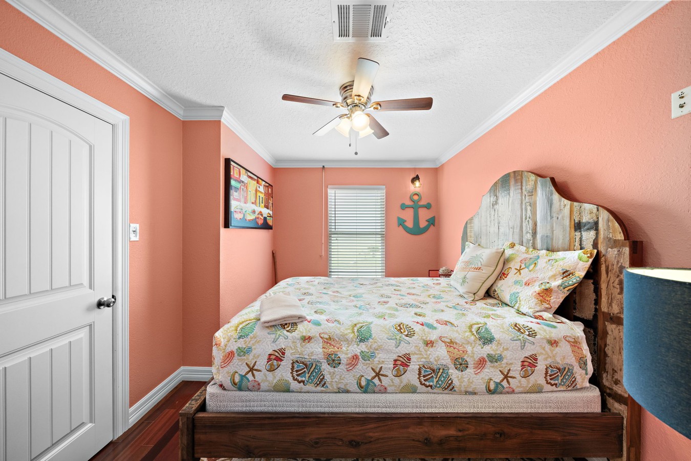 This bedroom has a queen-sized bed