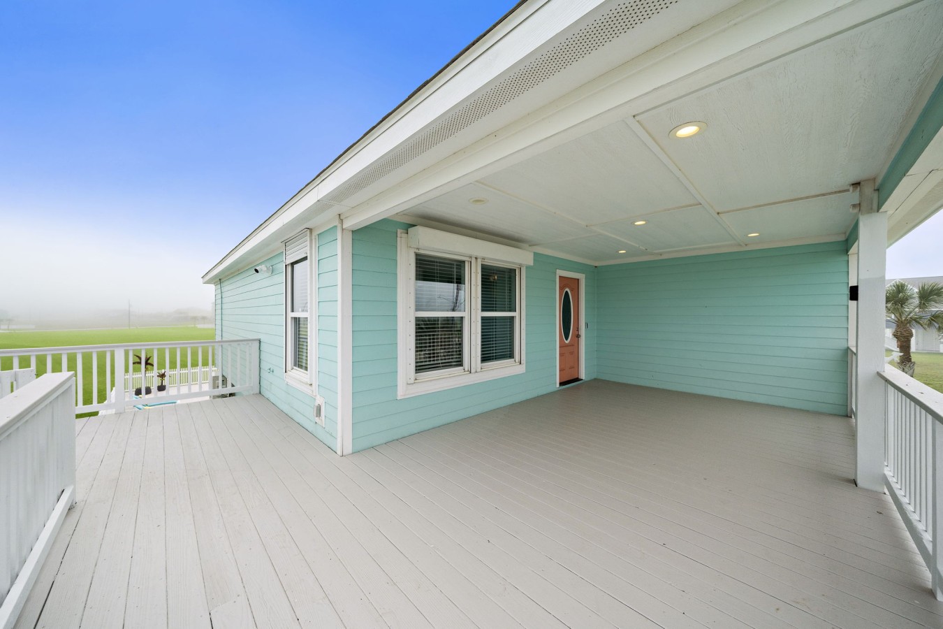 Spacious covered deck perfect for relaxing outdoors