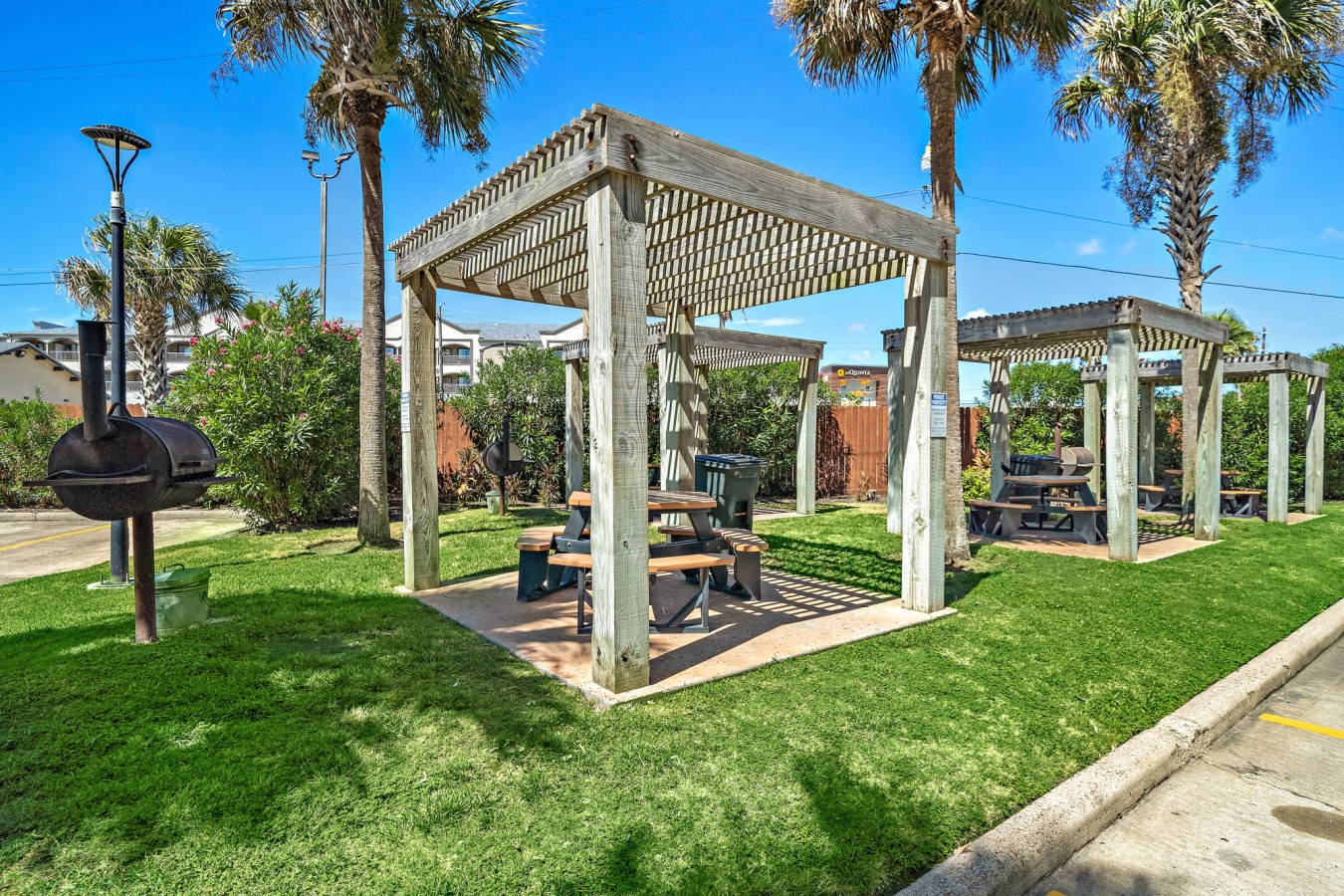 Grill up a feast and enjoy a meal under a pergola