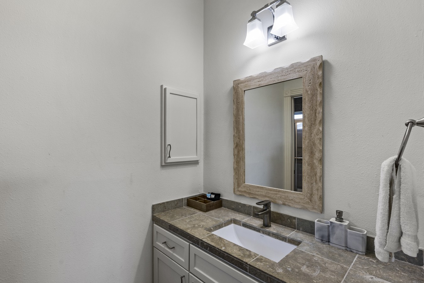 Refresh and rejuvenate in this bright bathroom