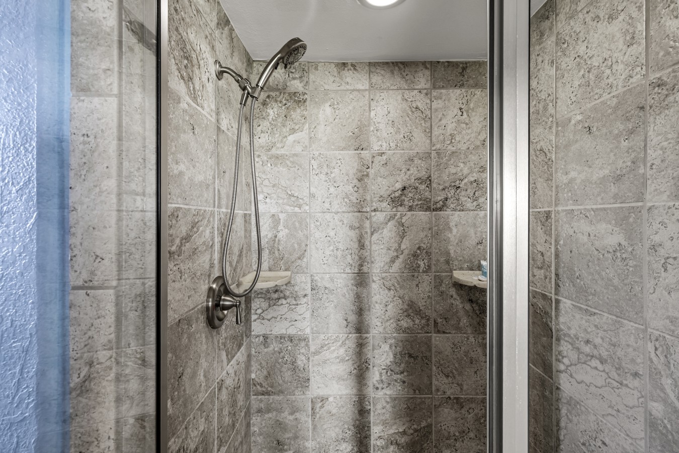 This bathroom features a walk-in shower