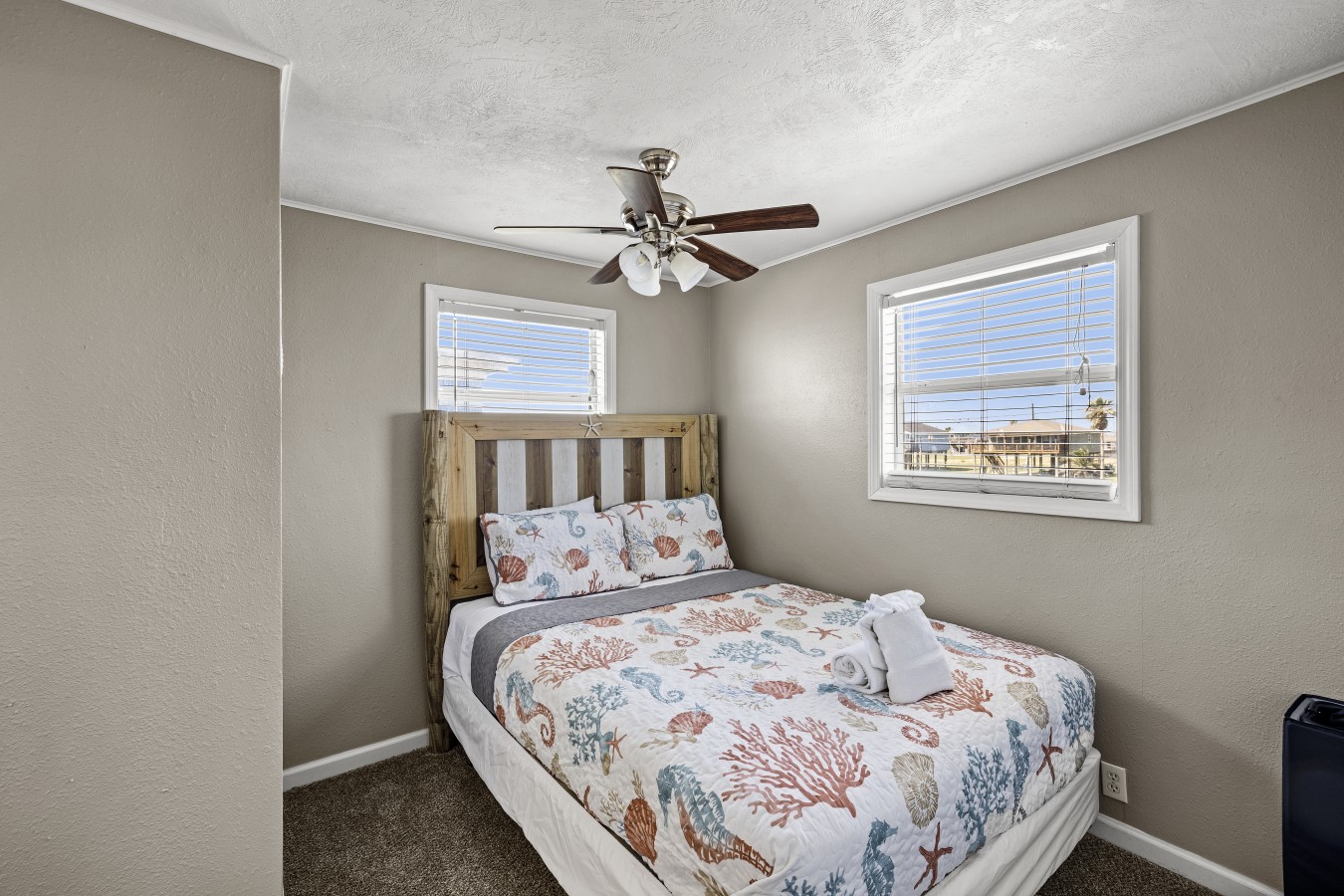 This bedroom has a queen-sized bed