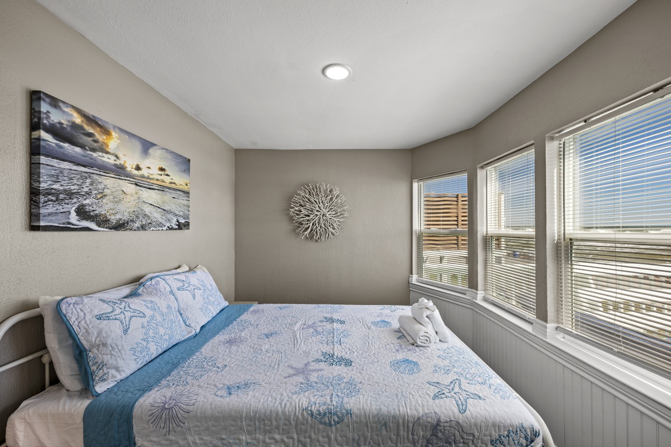 This bedroom has a queen-sized bed