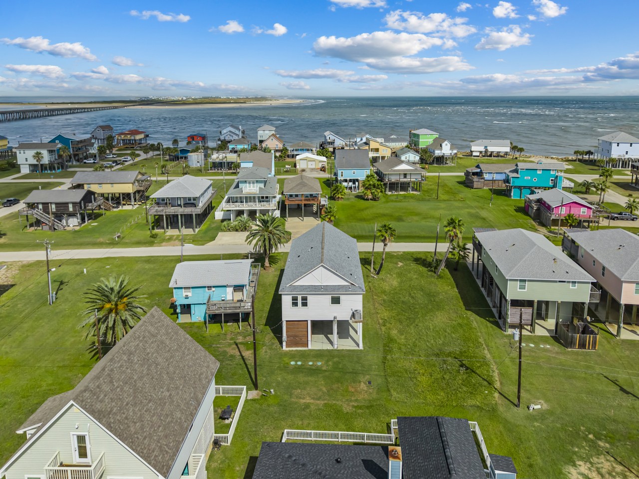 Palm trees, blue skies & water views all around