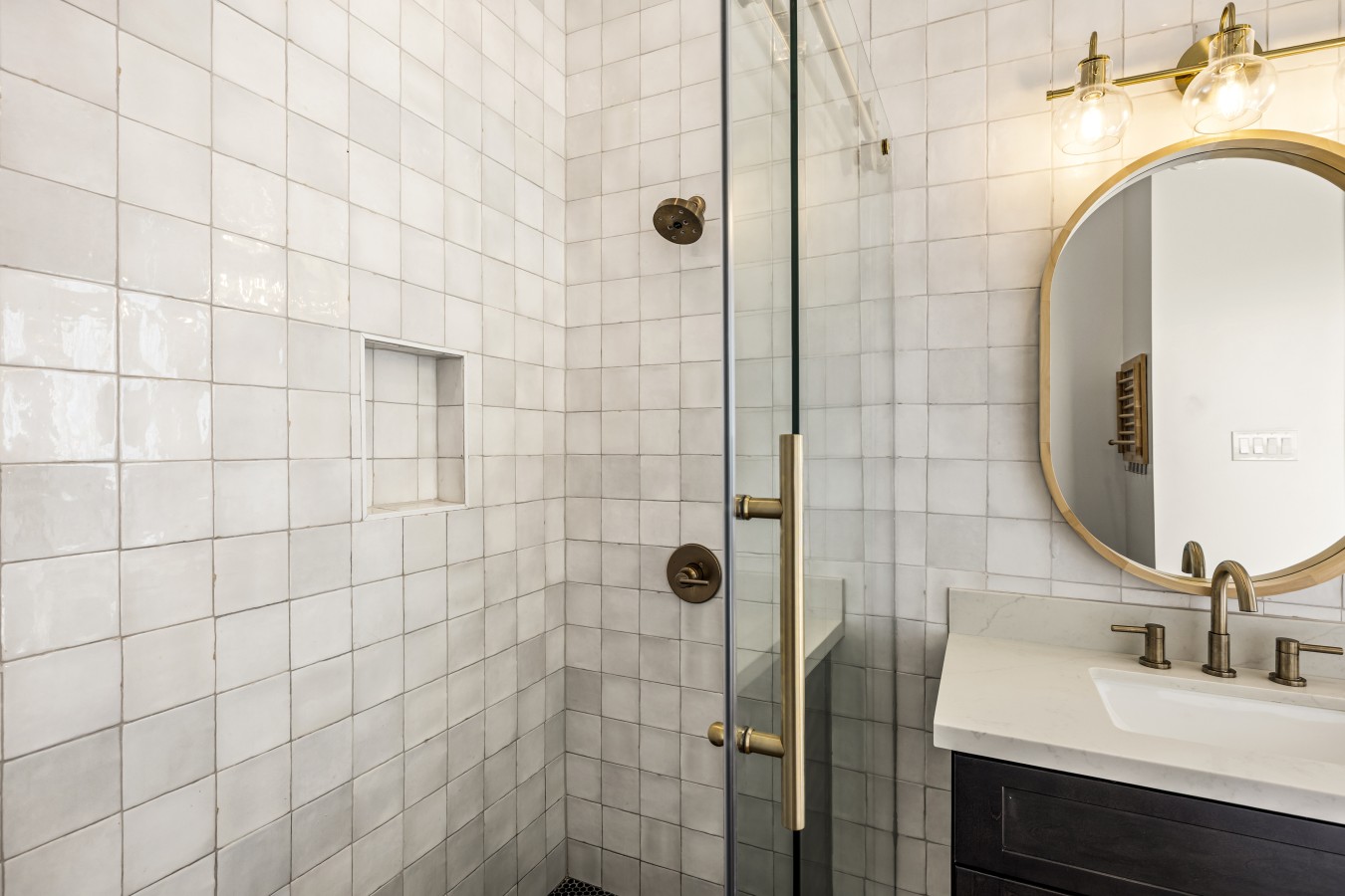 Rinse off the sand in the glass walk-in shower