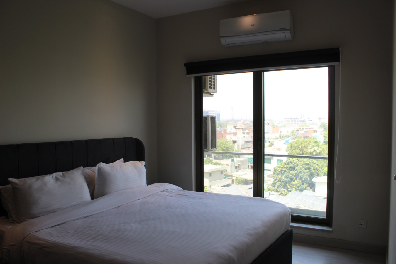 Studio Apt | Living Area | Balcony | The Opus