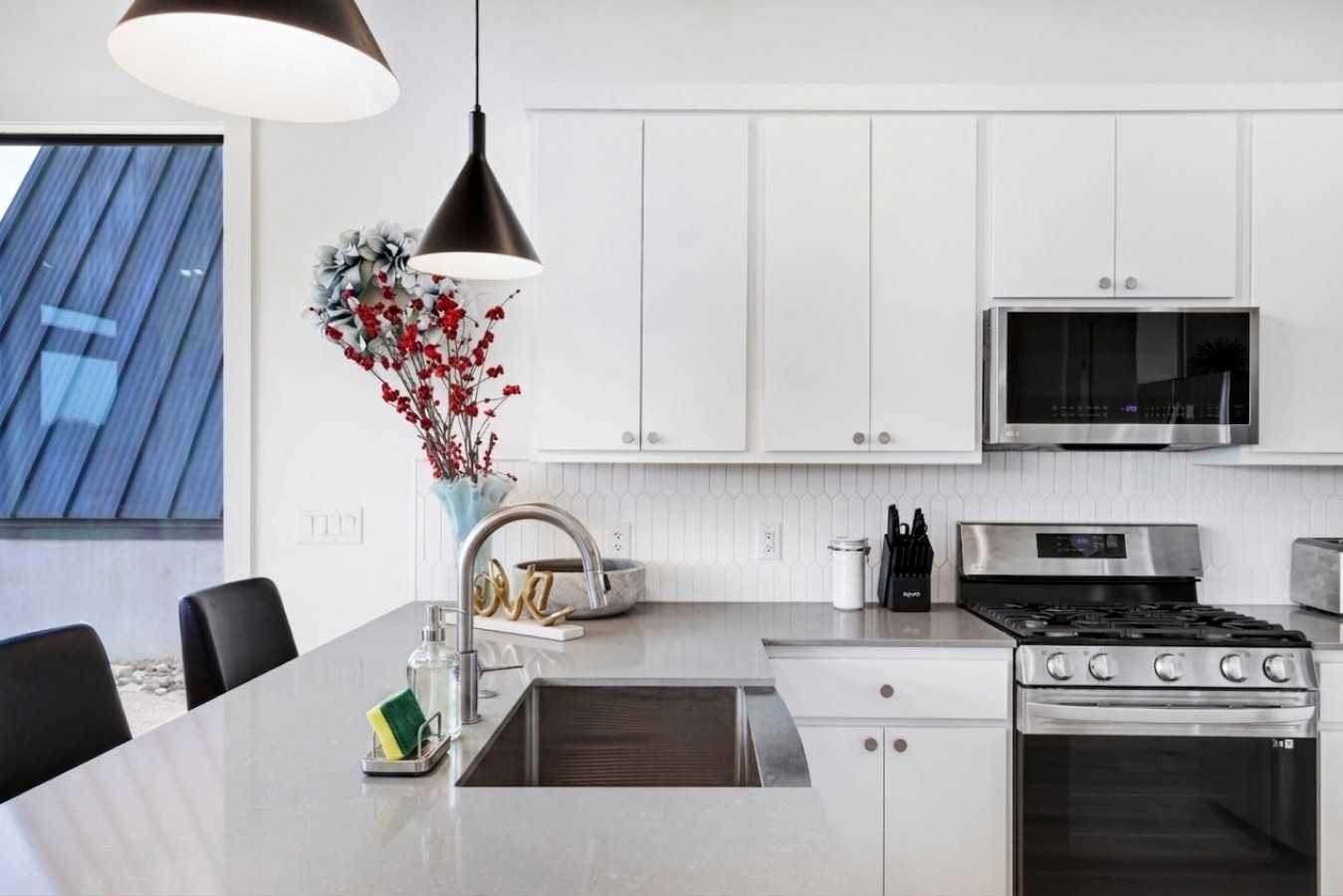 13-Kitchen-sink-and-oven-microwave-bar-seating.jpg