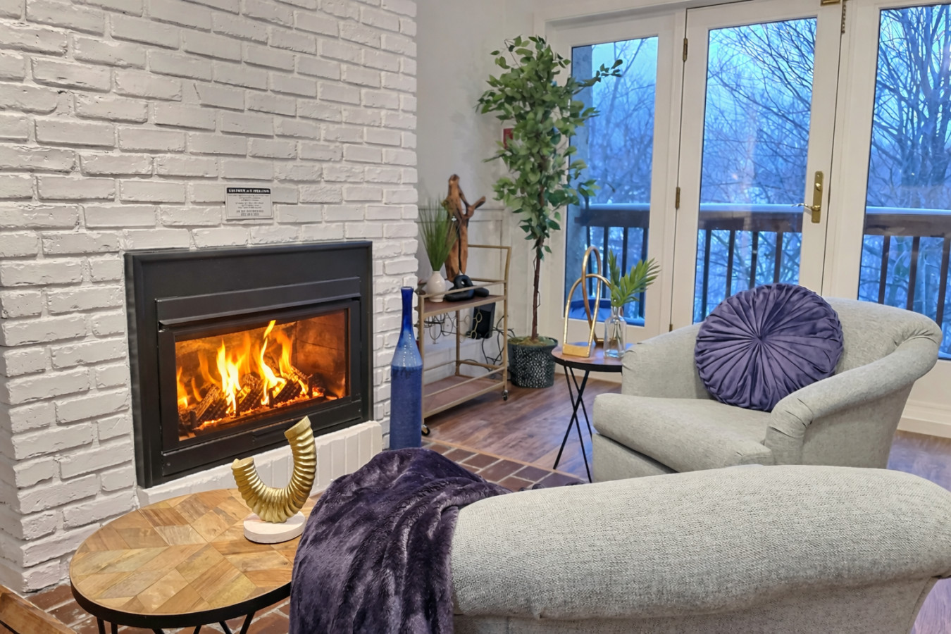 Inviting warmth emanates from the gas fireplace.