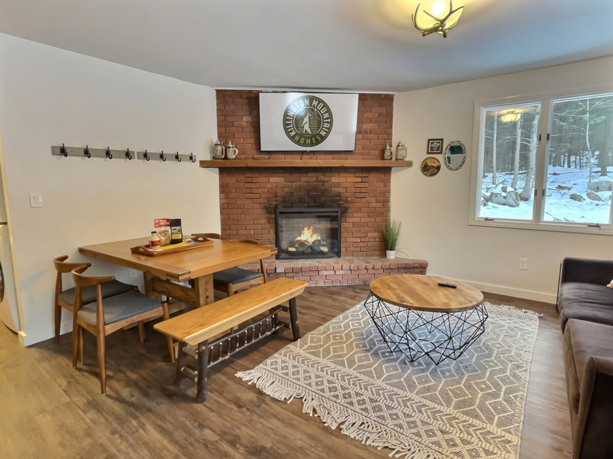 Cozy living and dining areas with space for relaxation and entertainment.