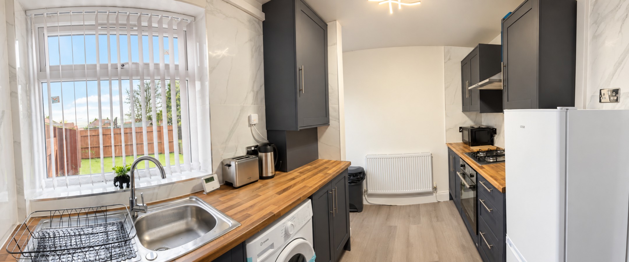 Cosy Jarrow 1-Bed | Driveway Parking & Garden in 8 Luss Ave, Jarrow NE32 4AR, UK - Property image 12 - VivreStays