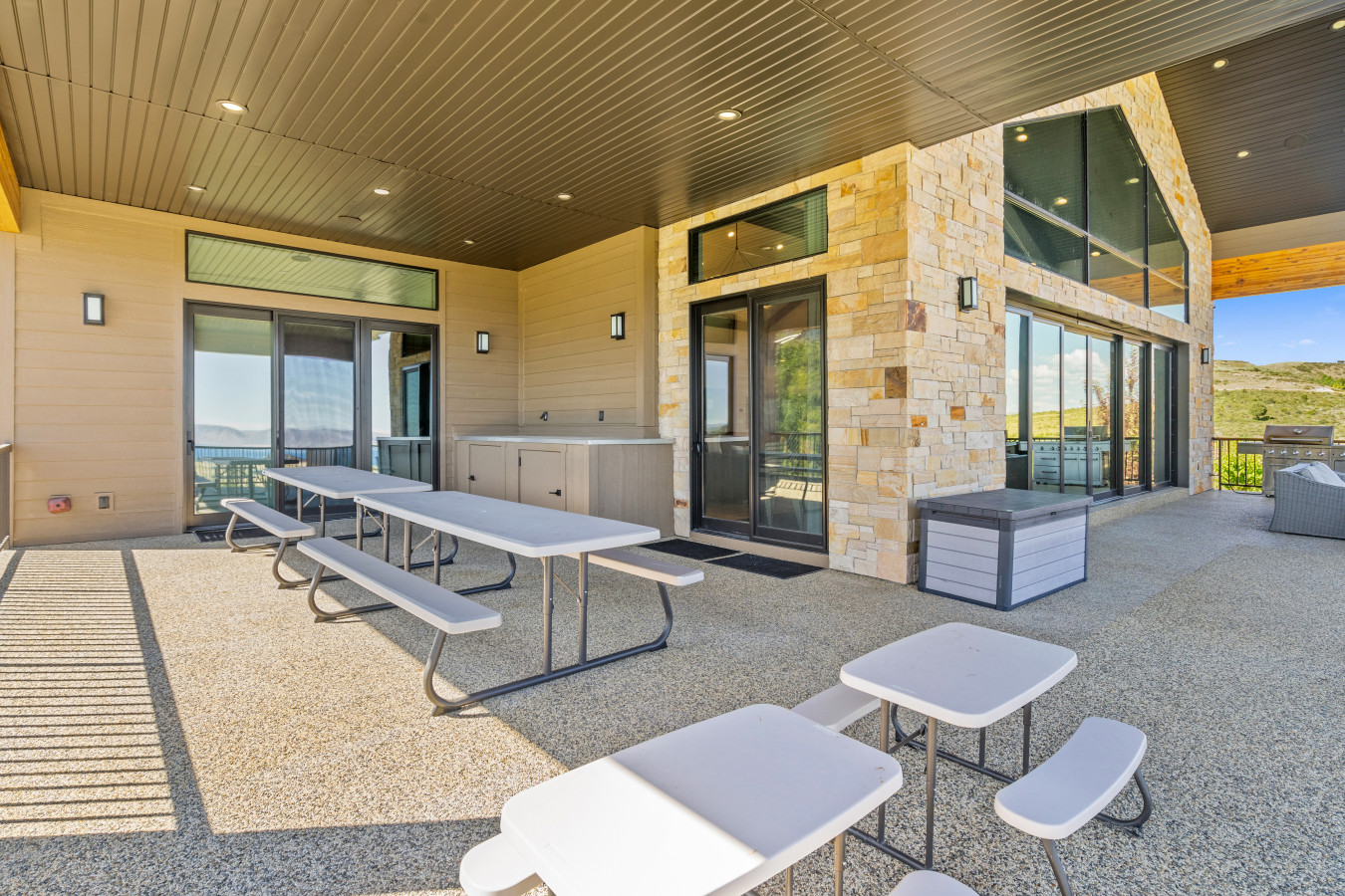 Spacious Back Deck with Firepit, Grill, Smoker and Tables. Back Yard and patio.