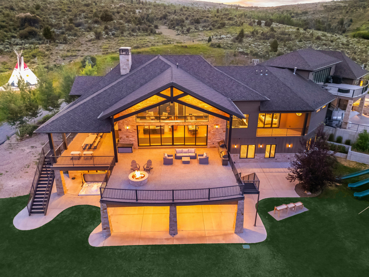 Spacious Back Deck with Firepit, Grill, Smoker and Tables. Back Yard and patio.