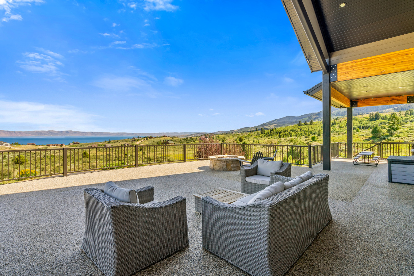 Spacious Back Deck with Firepit, Grill, Smoker and Tables. Back Yard and patio.