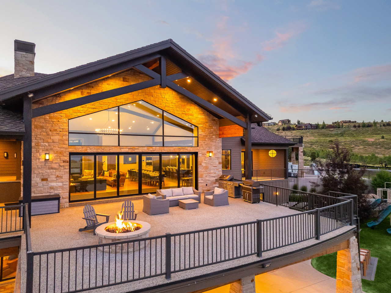 Spacious Back Deck with Firepit, Grill, Smoker and Tables. Back Yard and patio.