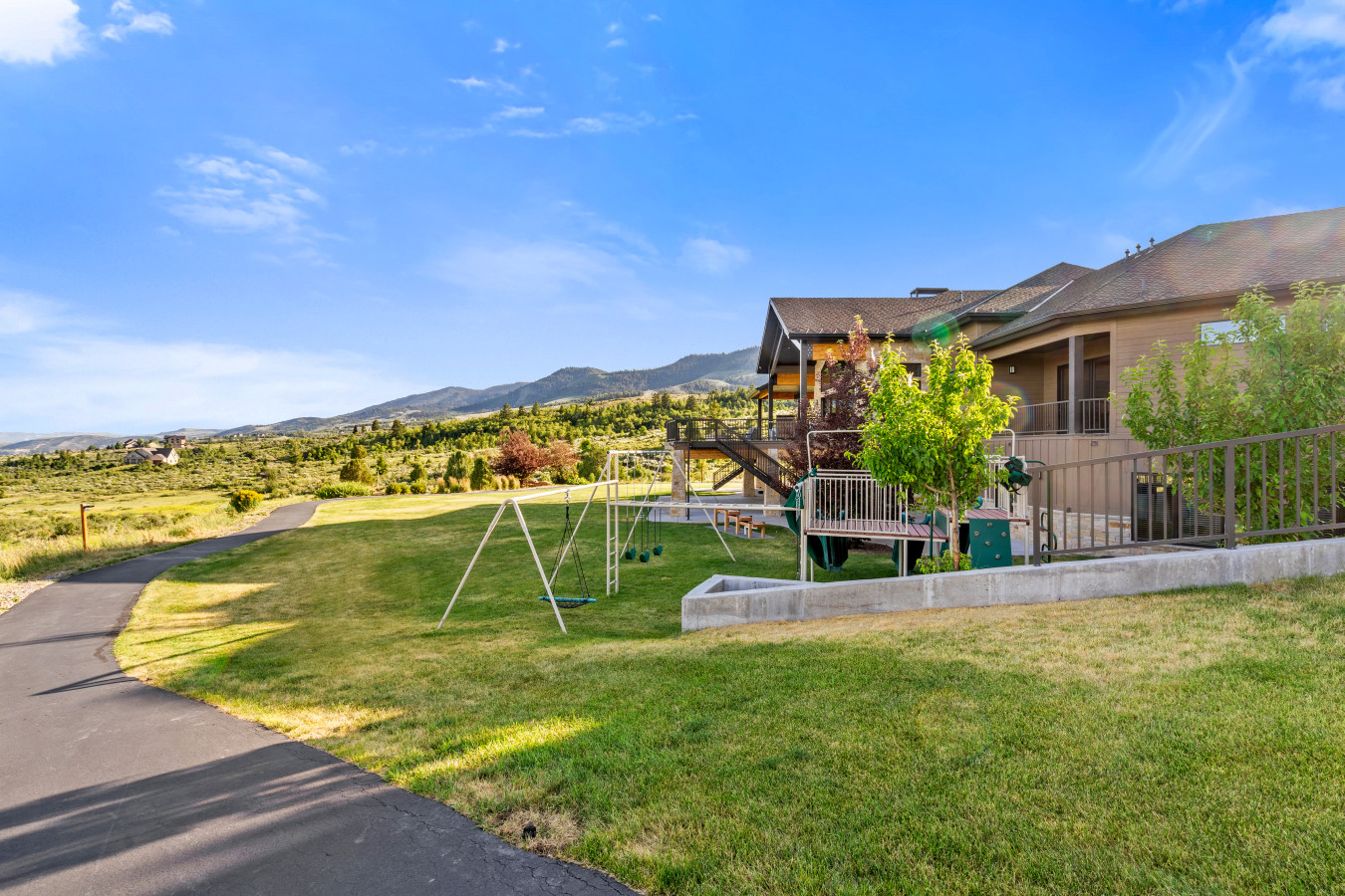 Spacious Back Deck with Firepit, Grill, Smoker and Tables. Back Yard and patio.