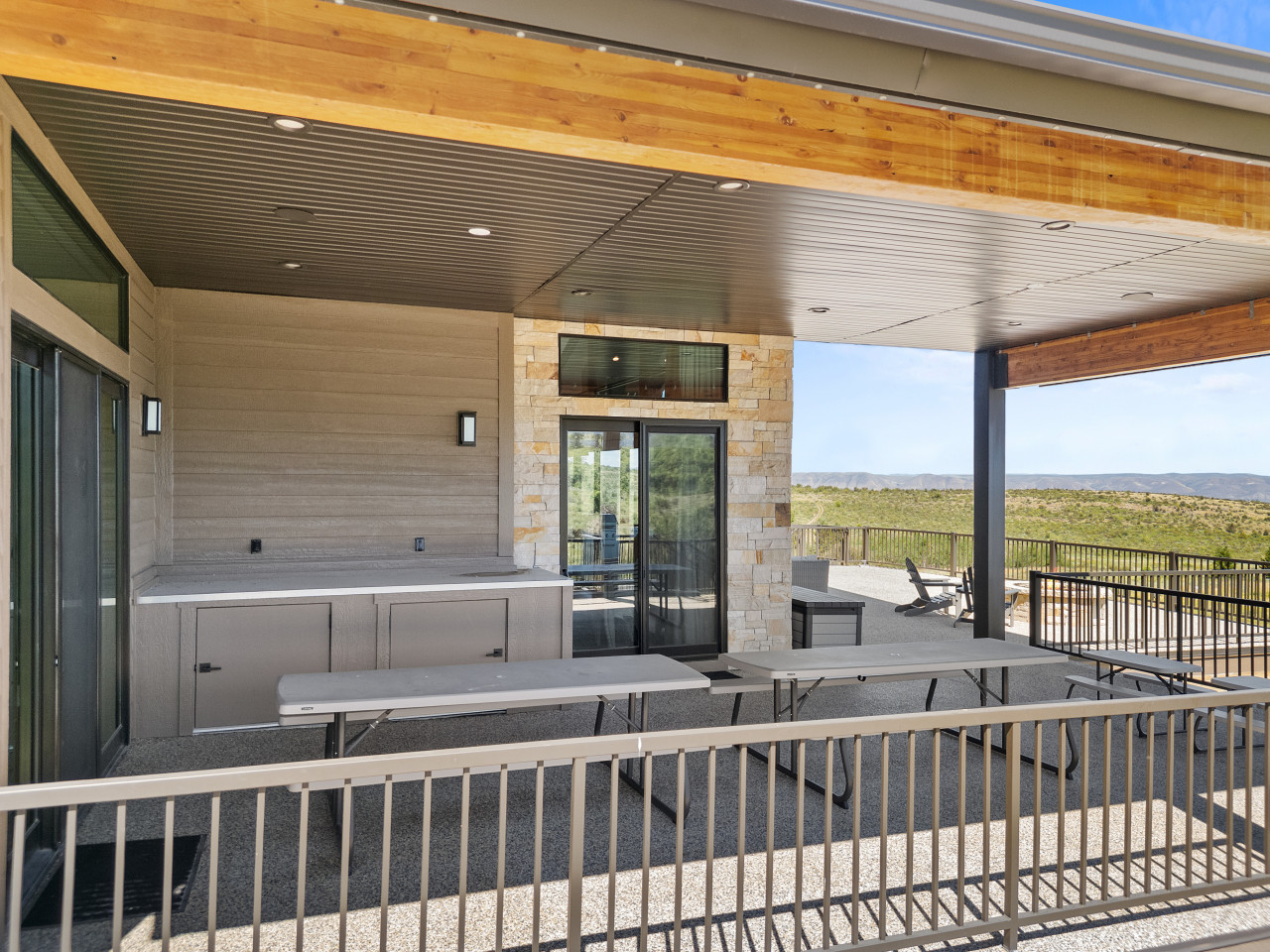 Spacious Back Deck with Firepit, Grill, Smoker and Tables. Back Yard and patio.