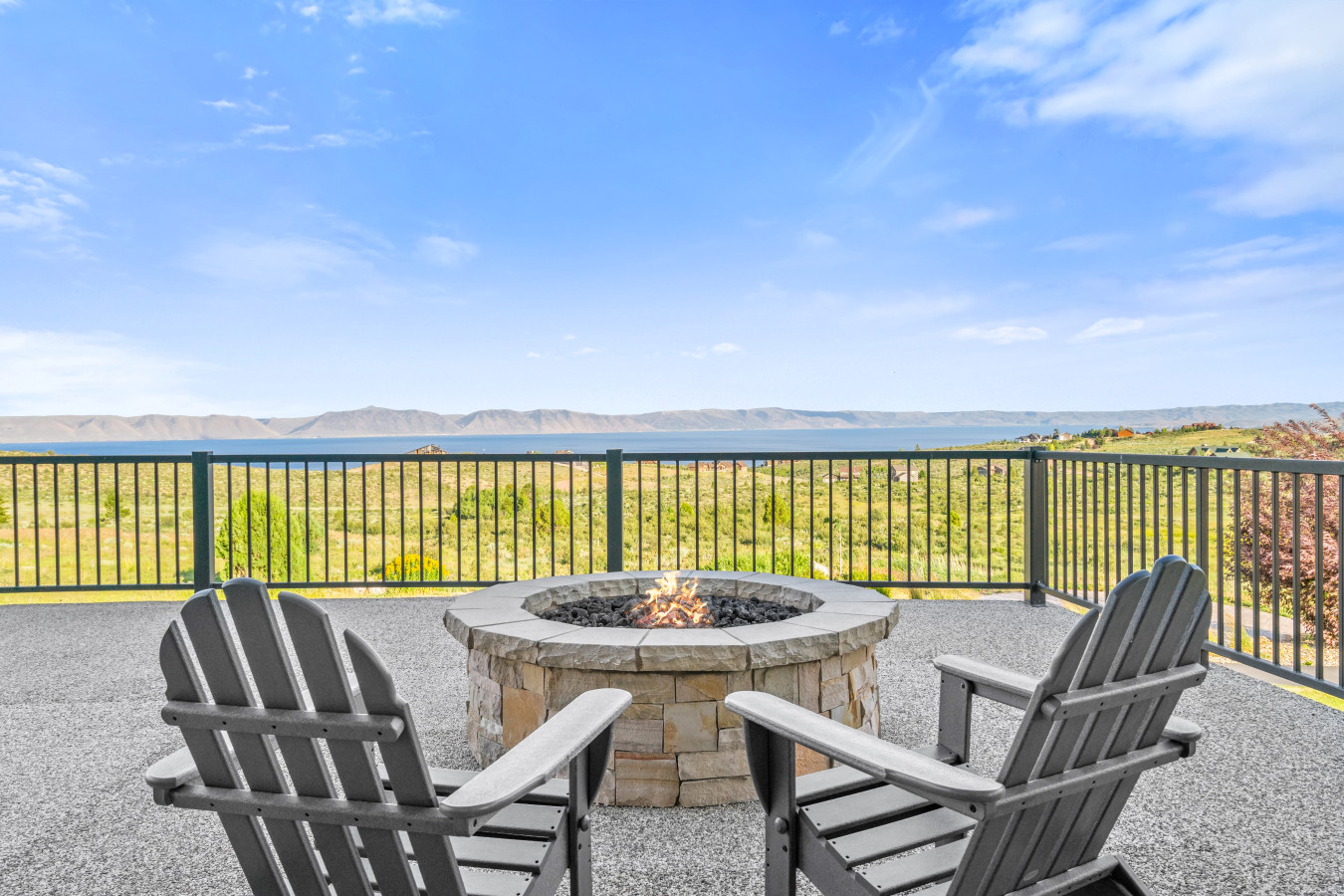 Spacious Back Deck with Firepit, Grill, Smoker and Tables. Back Yard and patio.