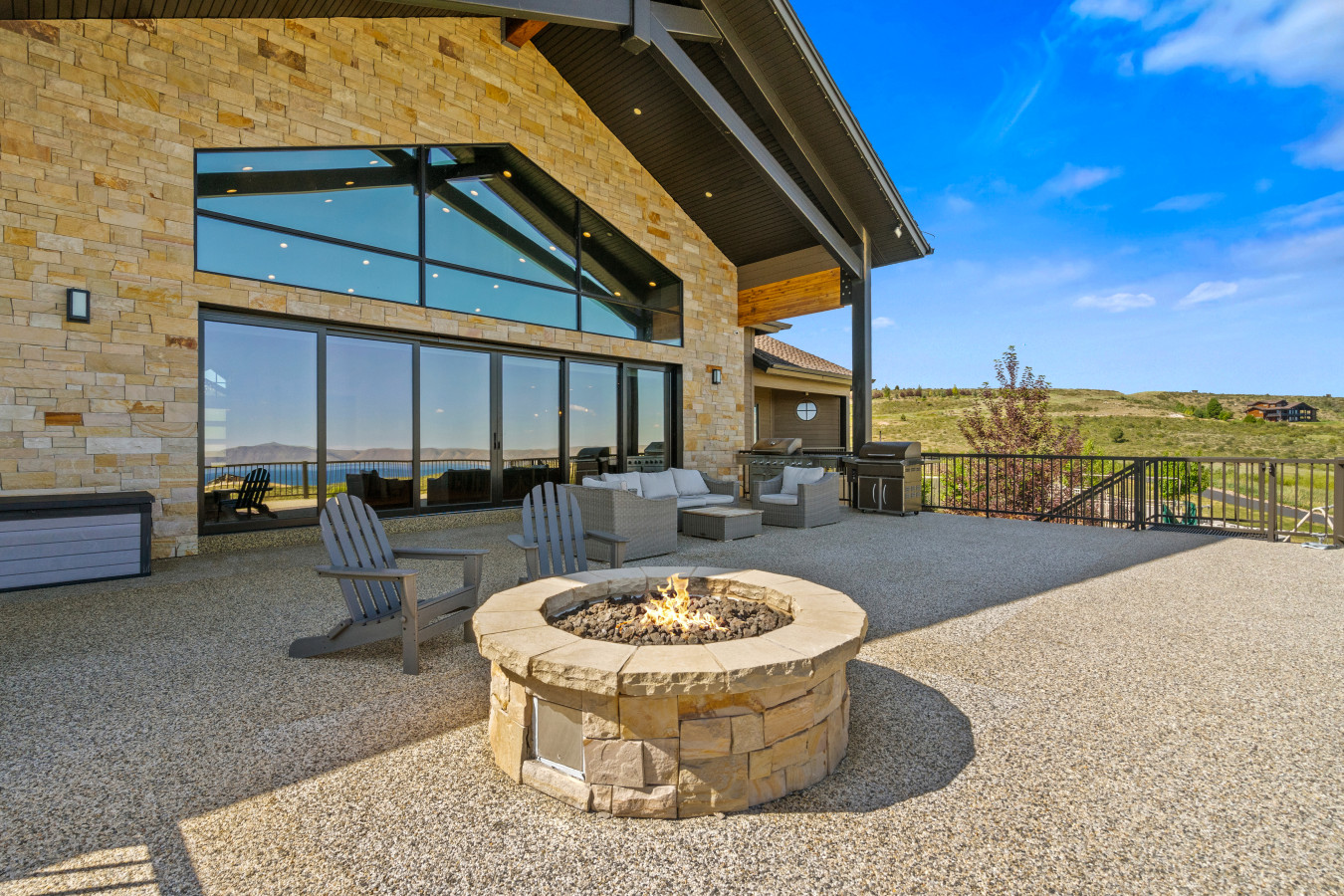 Spacious Back Deck with Firepit, Grill, Smoker and Tables. Back Yard and patio.