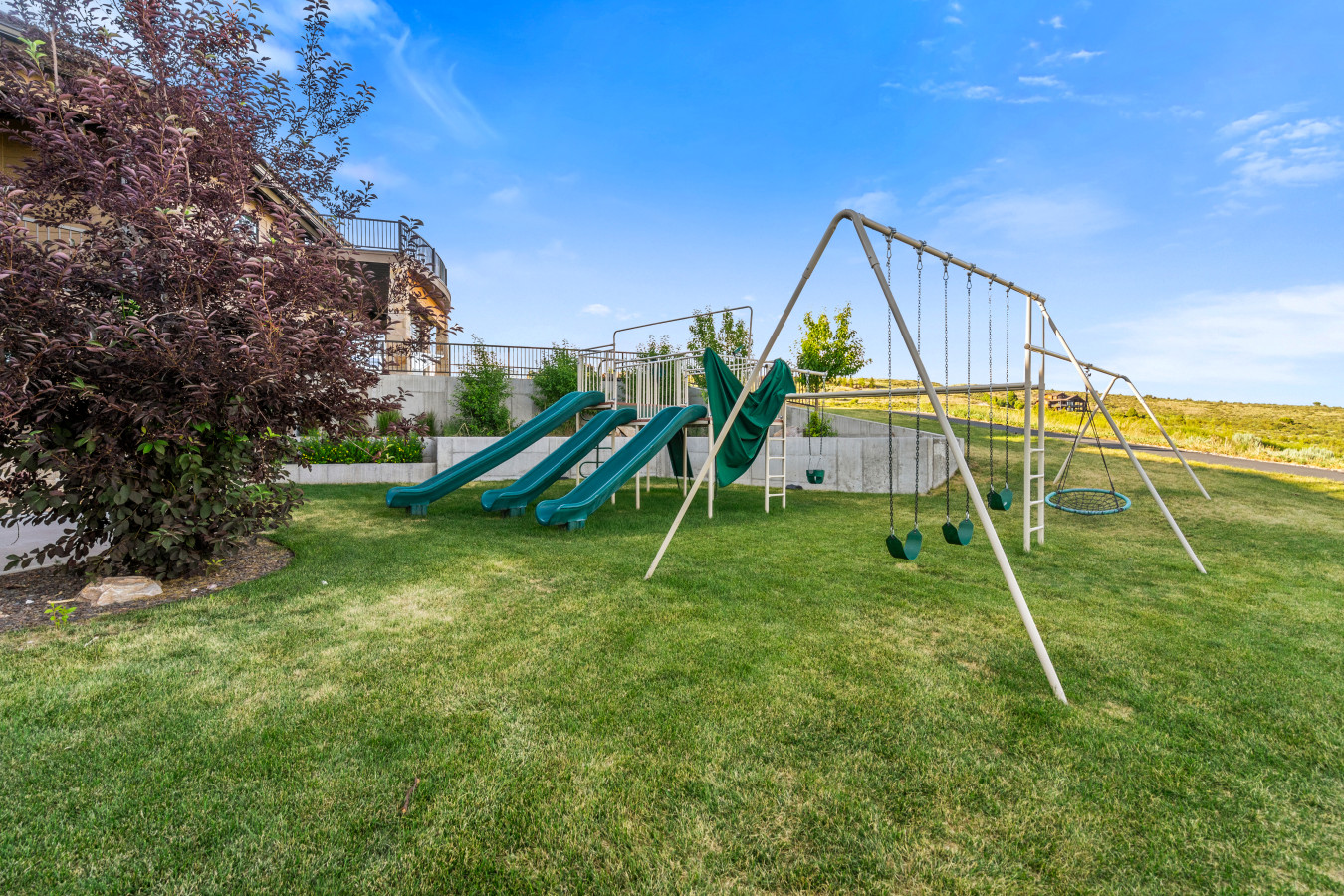 Spacious Back Deck with Firepit, Grill, Smoker and Tables. Back Yard and patio.