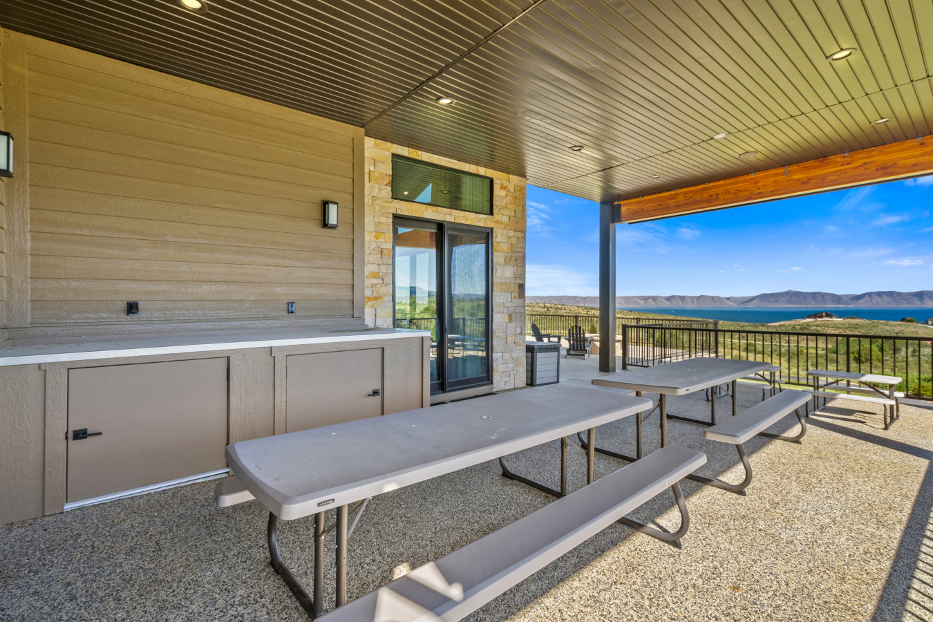 Spacious Back Deck with Firepit, Grill, Smoker and Tables. Back Yard and patio.