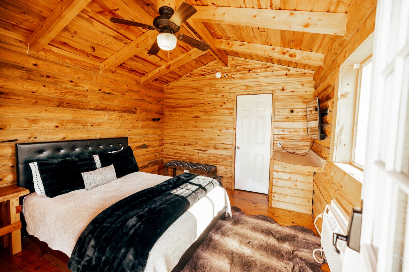 Queen bed with A/C and TV